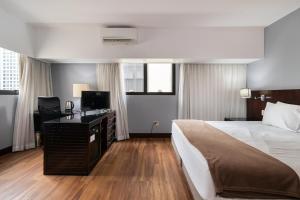 Ένα ή περισσότερα κρεβάτια σε δωμάτιο στο A1 Flats WYM Brooklin