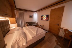 Zdjęcie z galerii obiektu HOTEL FONTANA w mieście Sappada