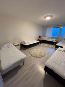 Katil atau katil-katil dalam bilik di Matka Mystical Lapland Home