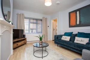 Et tv og/eller underholdning på Vacant Nests The Carrick Beach Golf Course