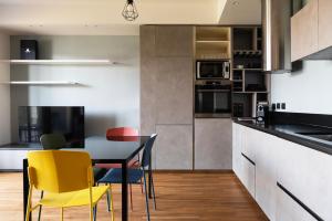 Η κουζίνα ή μικρή κουζίνα στο Youhosty - Pasolini 84