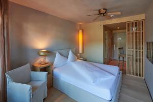 Ένα ή περισσότερα κρεβάτια σε δωμάτιο στο Sonne Seehotel