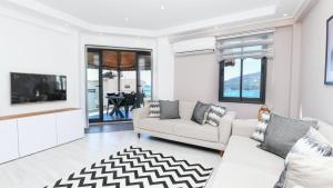 Et tv og/eller underholdning på Kalkan 2 Bedroom Apartment 7408