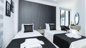 En eller flere senge i et værelse på Kalkan 2 Bedroom Apartment 7408 + 50 billeder