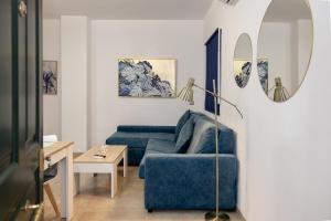 Χώρος καθιστικού στο Apartamentos TrianaSol