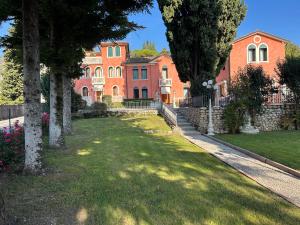 Fotografie z fotogalerie ubytování B&B Villa Carli v destinaci Caneva