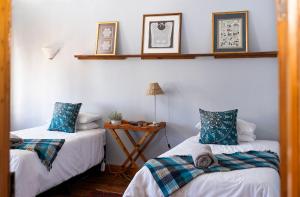 Ένα ή περισσότερα κρεβάτια σε δωμάτιο στο Magrieta's Manor House