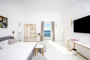 Postel nebo postele na pokoji v ubytování Gianlica Suites Positano