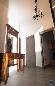 a room with a dressing table and a mirror at Home Turia Pio Apartamento de 3 habitaciones in Valencia
