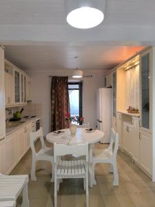 Kuchyň nebo kuchyňský kout v ubytování Poseidon Apartments