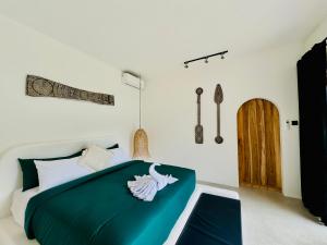 Postel nebo postele na pokoji v ubytování Ruma Mahavidna + 13 fotografií