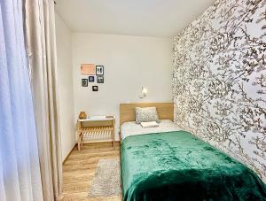 Postel nebo postele na pokoji v ubytování Japandi apartamentai + 123 fotografií