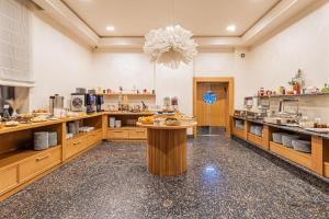 Kuchyň nebo kuchyňský kout v ubytování Premium hotel & SPA