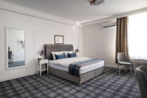 Postelja oz. postelje v sobi nastanitve Hotel Mio City