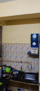 Η κουζίνα ή μικρή κουζίνα στο Cozy room in versova