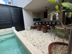 Πισίνα στο ή κοντά στο Casa Primavera I Punta de mita
