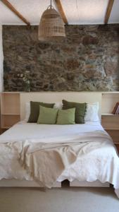 Ένα ή περισσότερα κρεβάτια σε δωμάτιο στο Casa Laurel +9 φωτογραφίες