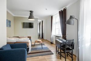 Μια τηλεόραση ή/και κέντρο ψυχαγωγίας στο New & Modern Old Riga apartment