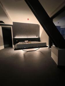a bedroom with a bed in a room at Corner 1 Bed Apart in Mercury Suites with Rooftop Pool Seasonal in St. Julianʼs