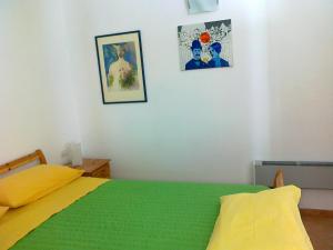 Postel nebo postele na pokoji v ubytování L' Amabile Geko
