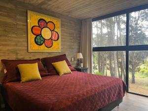 a bedroom with a large bed and a large window at Casa de lujo en Costa Esmeralda in Costa Esmeralda +49 photos