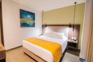 Postel nebo postele na pokoji v ubytování Hotel Zi One Luxury