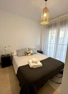 Postel nebo postele na pokoji v ubytování Apartamento vacacional Brisas de Galicia -Rías Baixas-