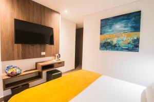 Postel nebo postele na pokoji v ubytování Hotel Zi One Luxury
