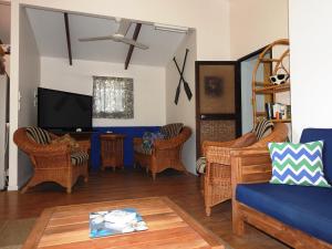 Svetainės erdvė apgyvendinimo įstaigoje Aremango Guesthouse