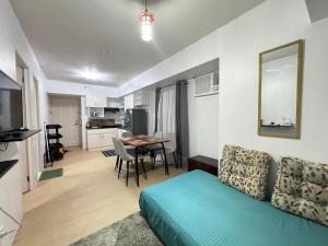 Kuchyň nebo kuchyňský kout v ubytování Luxanos Condo Place- Avida Tower, IT Park