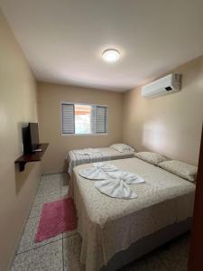 Postel nebo postele na pokoji v ubytování Casa Bouganville apto triplo