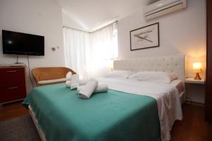 Posteľ alebo postele v izbe v ubytovaní Apartments Wow Barbalic