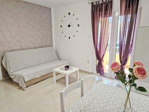 Postel nebo postele na pokoji v ubytování Sunshine Residence Baska 2
