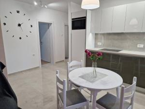 Kuchyň nebo kuchyňský kout v ubytování Sunshine Residence Baska 2