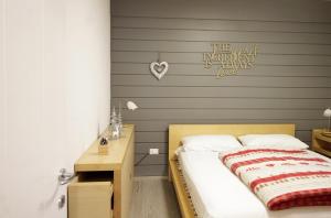 Posteľ alebo postele v izbe v ubytovaní CASA 4 PIOPPI - Agenzia Dolomiti Affitti