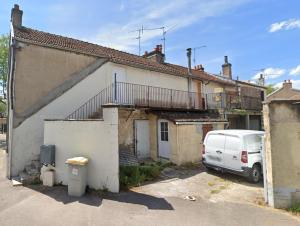 a white van parked in front of a house at Studio 20m2 - stationnement gratuit - WiFi in Dijon