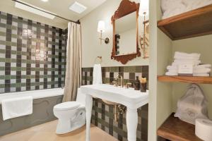 a bathroom with a sink and a toilet at The Leona in Lockhart +70 photos