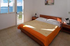 Ένα ή περισσότερα κρεβάτια σε δωμάτιο στο Holiday Home Biserka