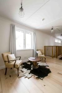 Area soggiorno di The Pear Orchard Lodge