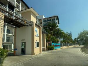 an empty street in front of a building at Cha-am , Cityscape Comfort , Near Cha-am Beach South in Cha Am