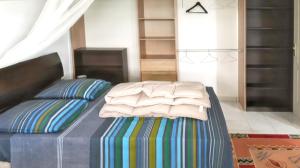 Postel nebo postele na pokoji v ubytování Appartement moderne à Ducos, idéal pour 4 personnes, 75 m²