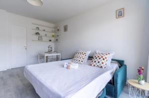 Postel nebo postele na pokoji v ubytování Grand studio vue mer à Antibes
