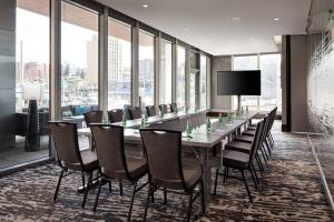 a conference room with a long table and chairs at Residence Inn by Marriott Seattle Downtown Convention Center in Seattle