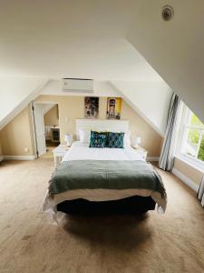 Postel nebo postele na pokoji v ubytování Chandler Heights Guesthouse