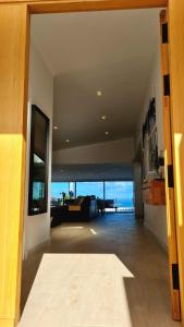 a view of a living room with a view of the ocean at Cachito de Cielo in La Victoria de Acentejo