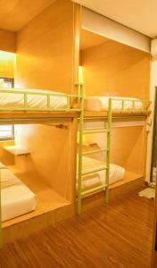 Postel nebo postele na pokoji v ubytování Leaf Sustainable Hostel