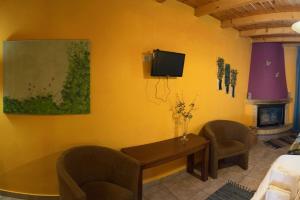 TV a/nebo společenská místnost v ubytování Guesthouse Teloni