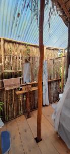 Balkón nebo terasa v ubytování MALOCA - Chalé Rústico + 6 fotografií