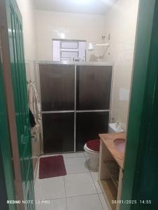 Ένα μπάνιο στο Apartamento Itapuã
