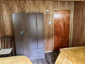 Postel nebo postele na pokoji v ubytování Hostel Los Teros